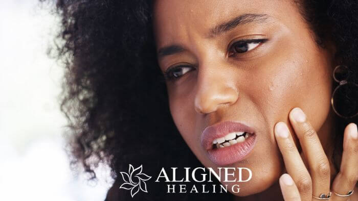 Woman with TMJ jaw pain